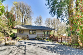 Riverfront Woodland Cabin with Wood-Burning Stove
